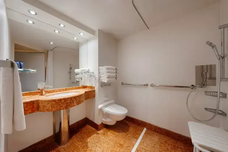 MSC25042678MSC Splendida, MSC Yacht Club Deluxe Suite for guests with disabilities or reduced mobility - Bathroom (YC1).webp